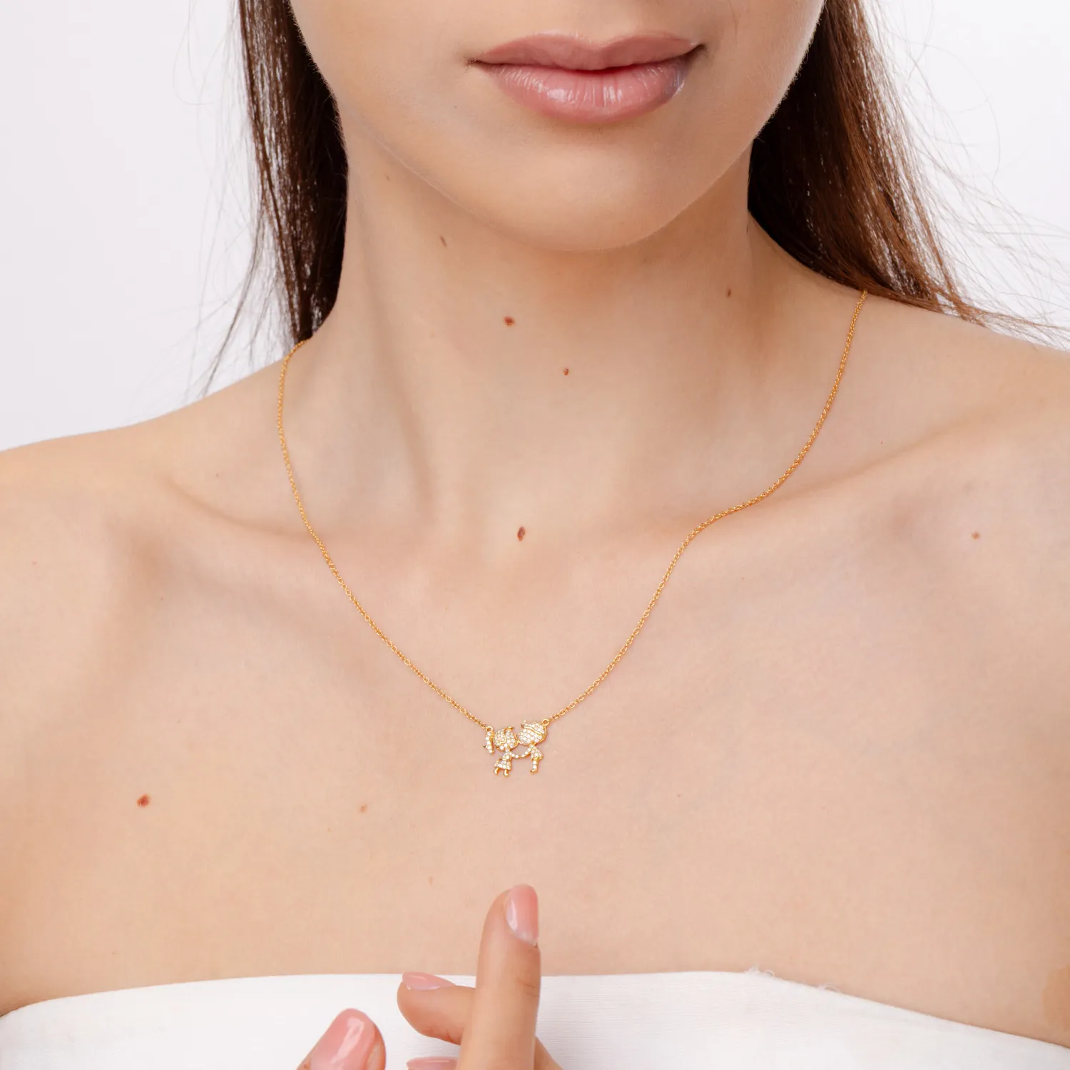 Lant cu pandantiv fetita si baiat din aur galben cu diamante baguette si rotunde de 0.27ct