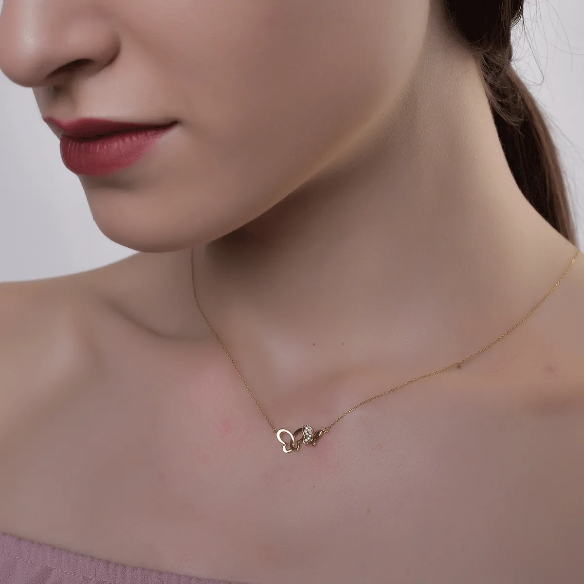 Lant cu pandantiv fluturi din aur galben cu diamante de 0.02ct