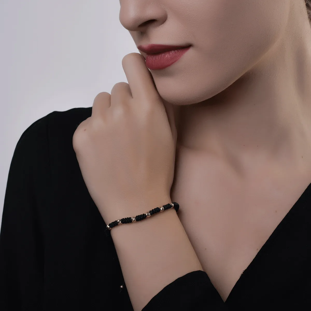 14K-os sárga arany karkötő fekete zsinórral