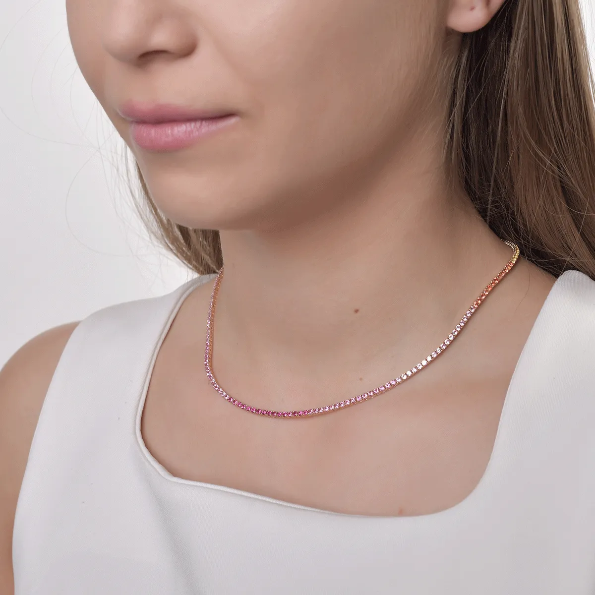 18K rose gold tennis necklace with 7.6ct multicolored sapphires
