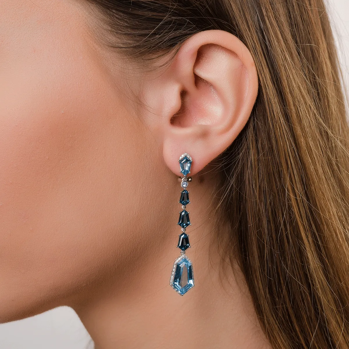 18K white gold earrings with 18.2ct blue topaz