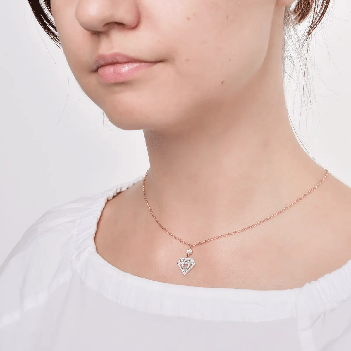 Lant cu pandantiv din aur alb-roz cu diamante de 0.29ct