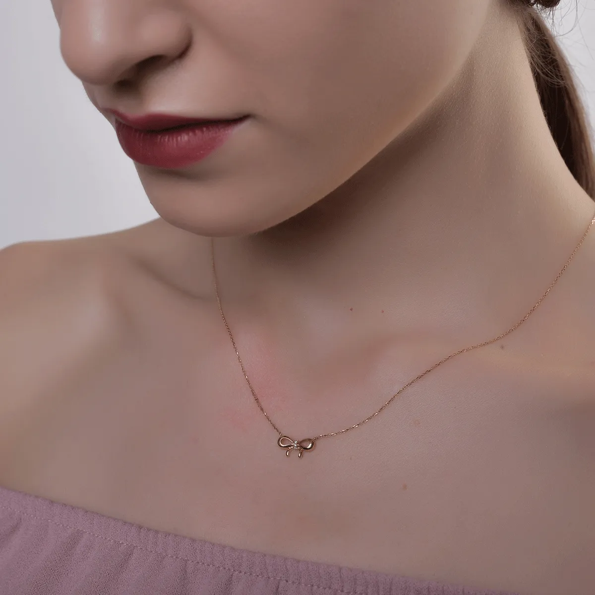 18K rose gold knot pendant necklace with 0.01ct diamonds