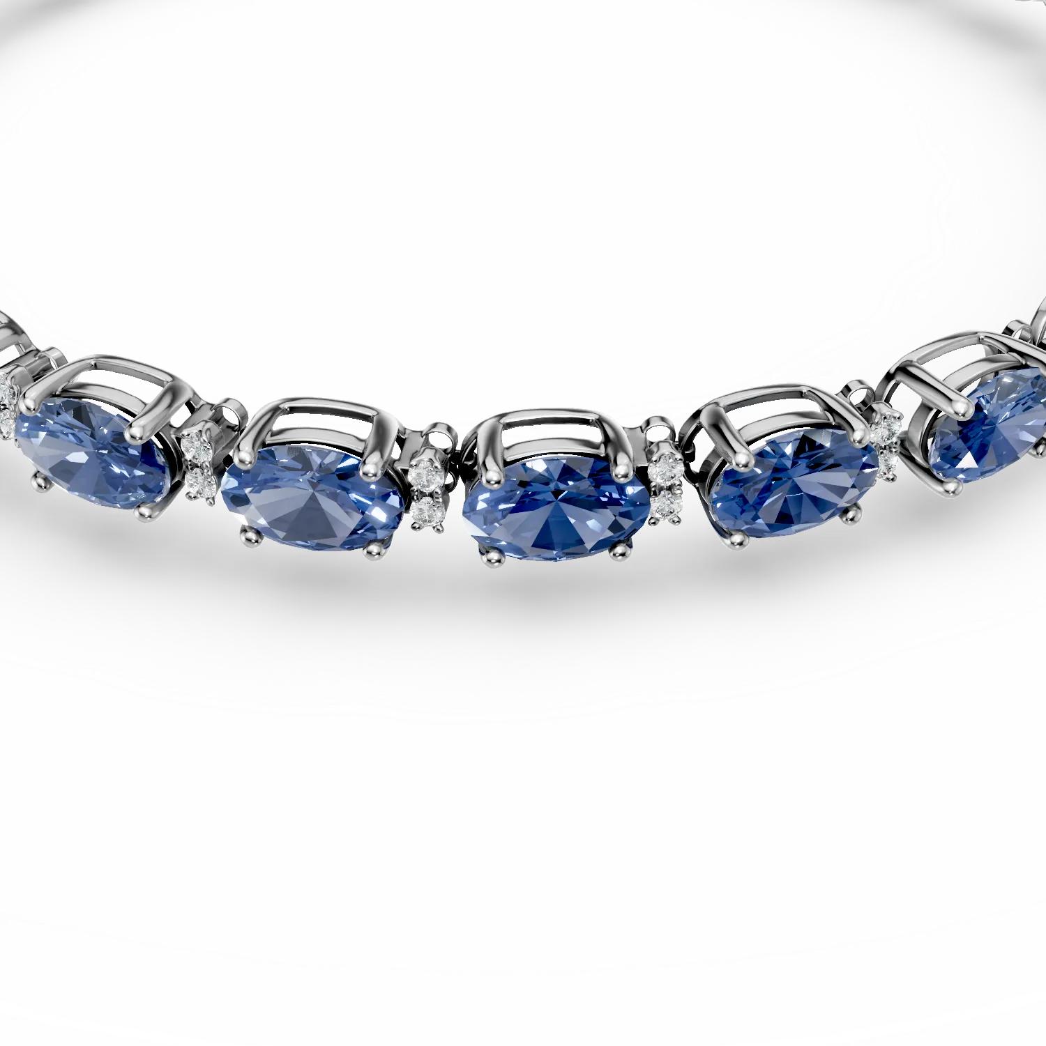 18K fehérarany tenisz karkötő 11.85ct tanzanitokkal és 0.24ct gyémántokkal