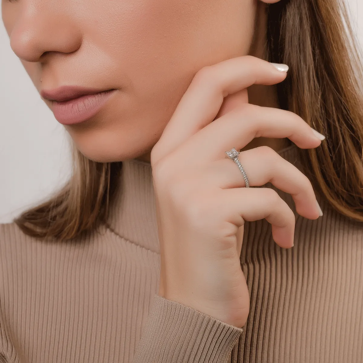 Diamond platinum engagement ring with 0.6ct diamond and 0.185ct diamonds