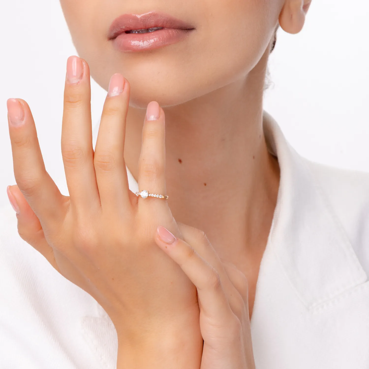 Eljegyzési gyűrű 18K-os rozé aranyból 0.4ct gyémánttal és 0.14ct gyémántokkal