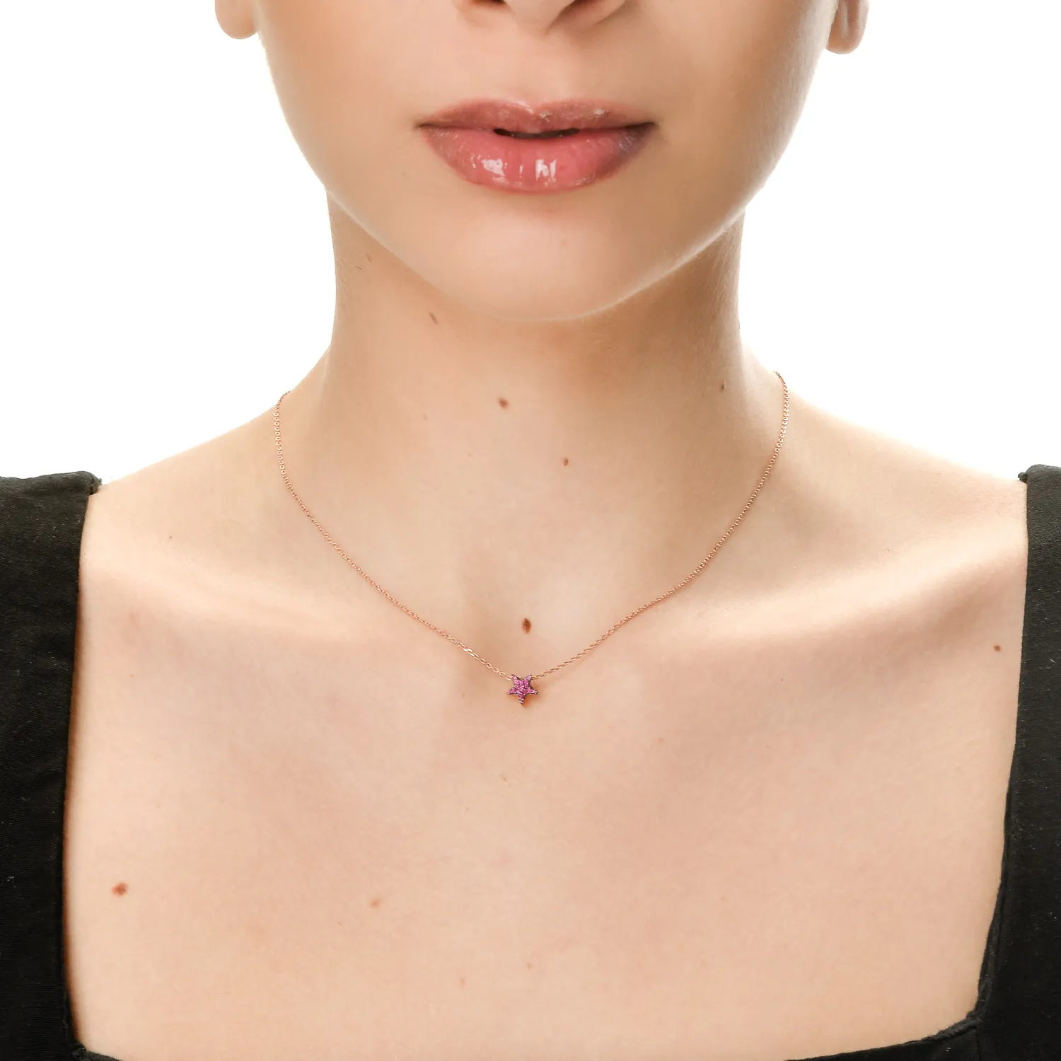 Zawieszka gwiazda z 18K różowego złota z rubinami 0.1ct