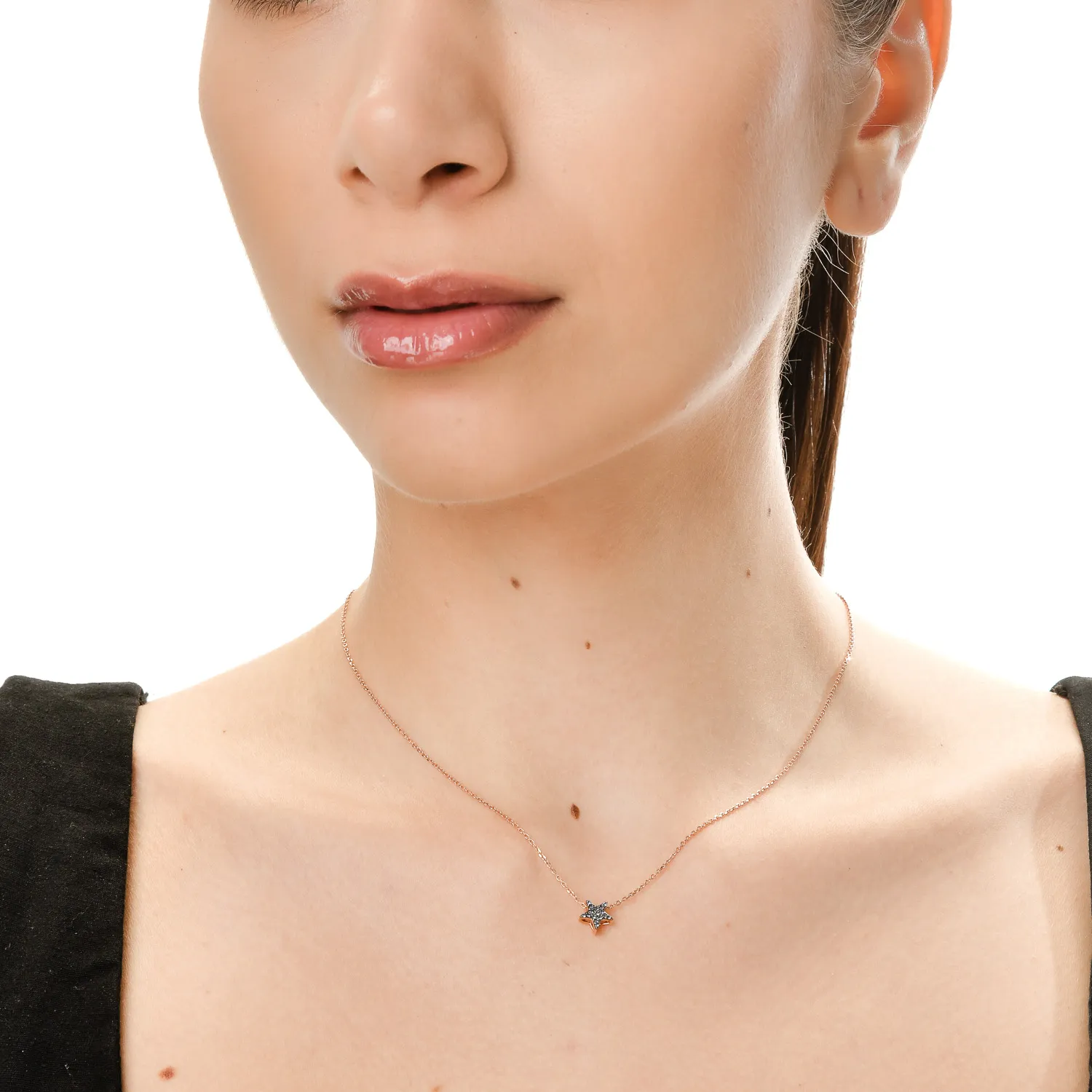 Wisiorek gwiazda z różowego złota z szafirami o masie 0.1ct