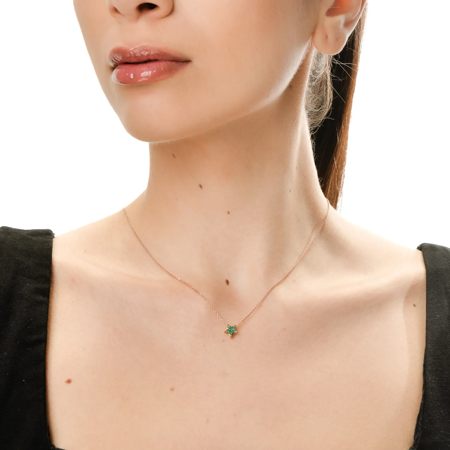 Zawieszka gwiazda z 18K różowego złota ze szmaragdami o masie 0.07ct