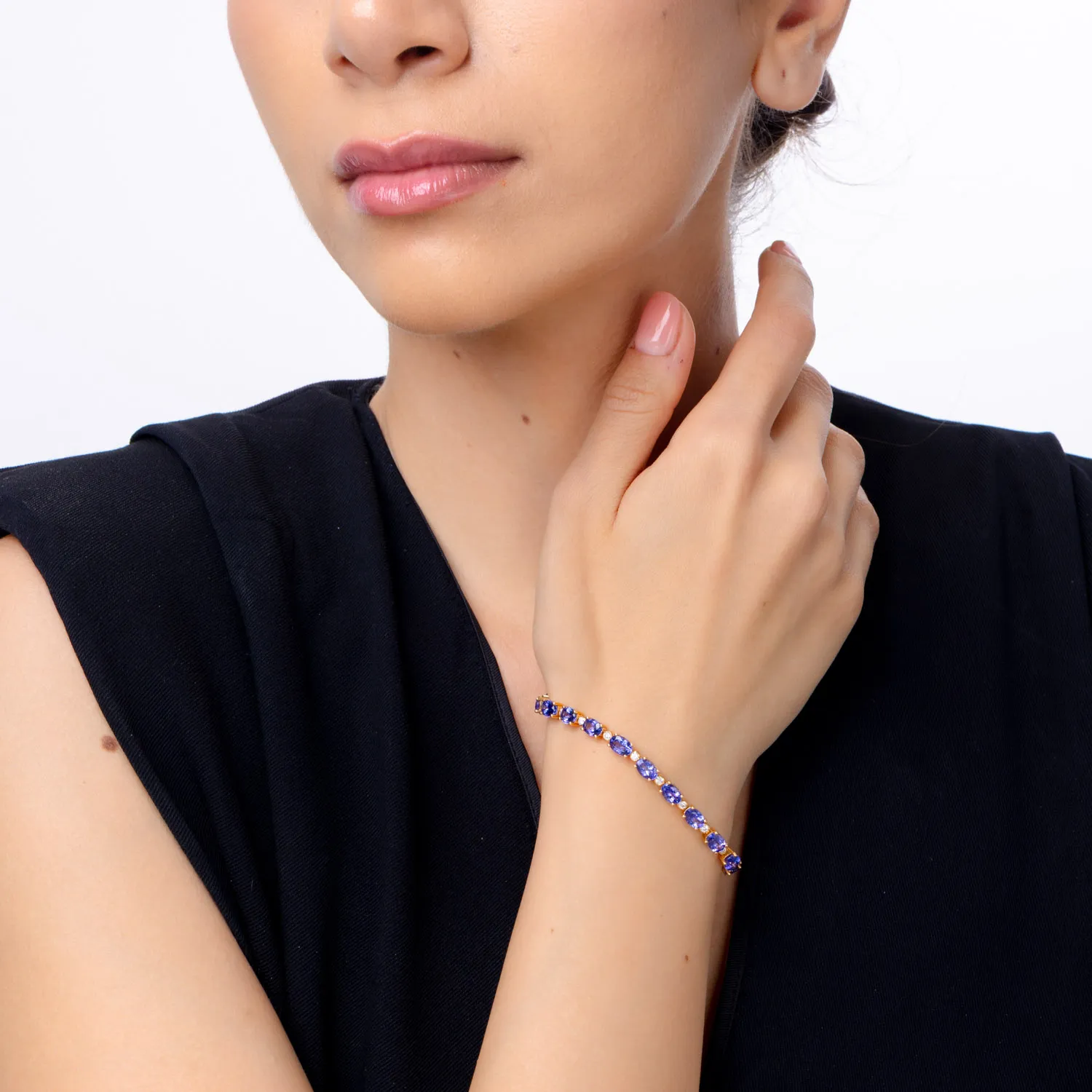 Bratara tennis din aur galben cu tanzanite ovale de 13.05ct si diamante de 0.85ct