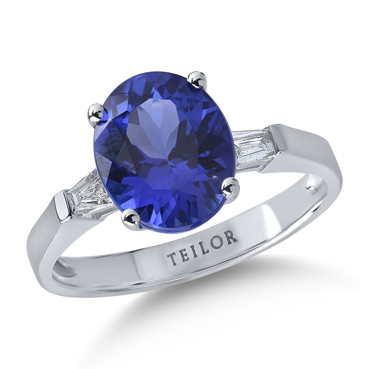 Inel din aur alb cu tanzanit oval de 2.8ct si diamante baguette de 0.1ct