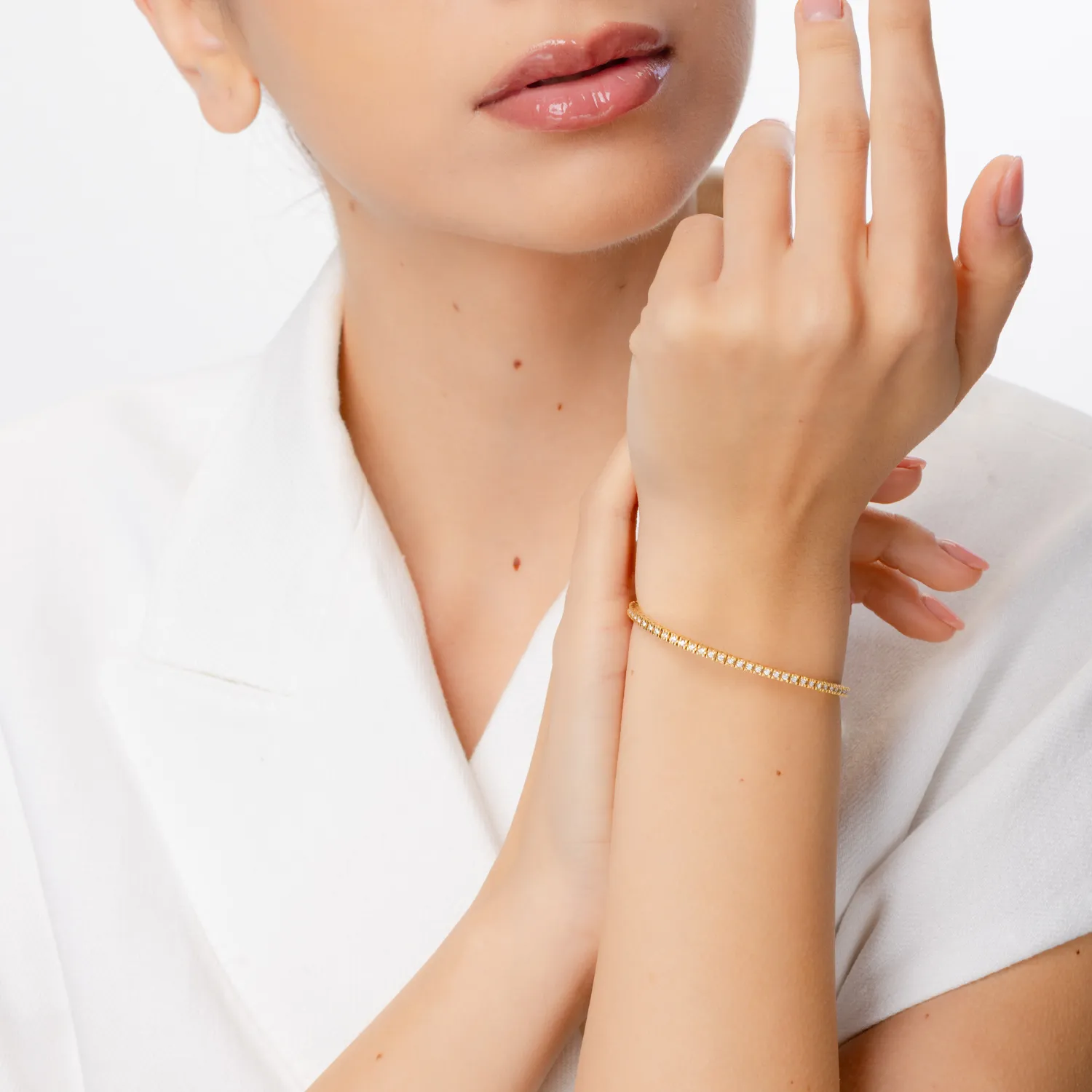 Bransoletka tenisowa z żółtego złota z diamentami o masie 0.91ct