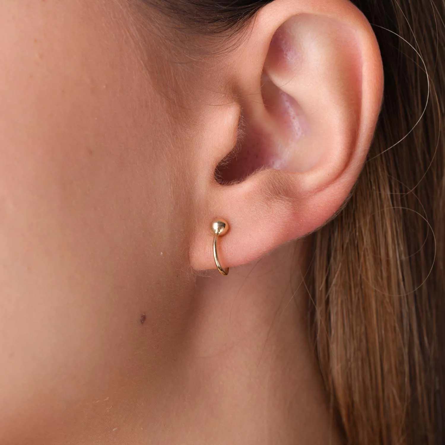 Yellow gold round ear cuffs