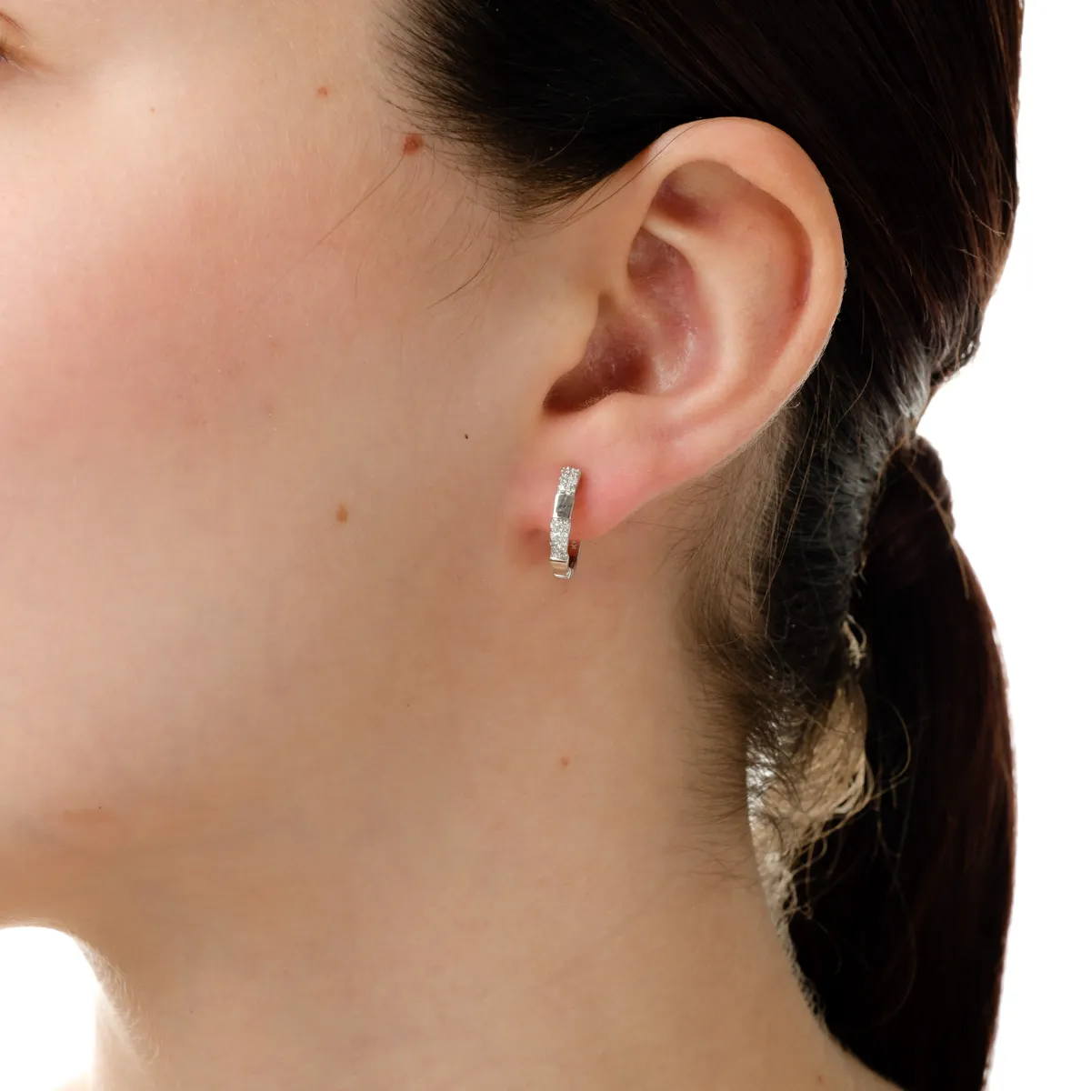 White gold on-ear earrings with 0.17ct diamonds