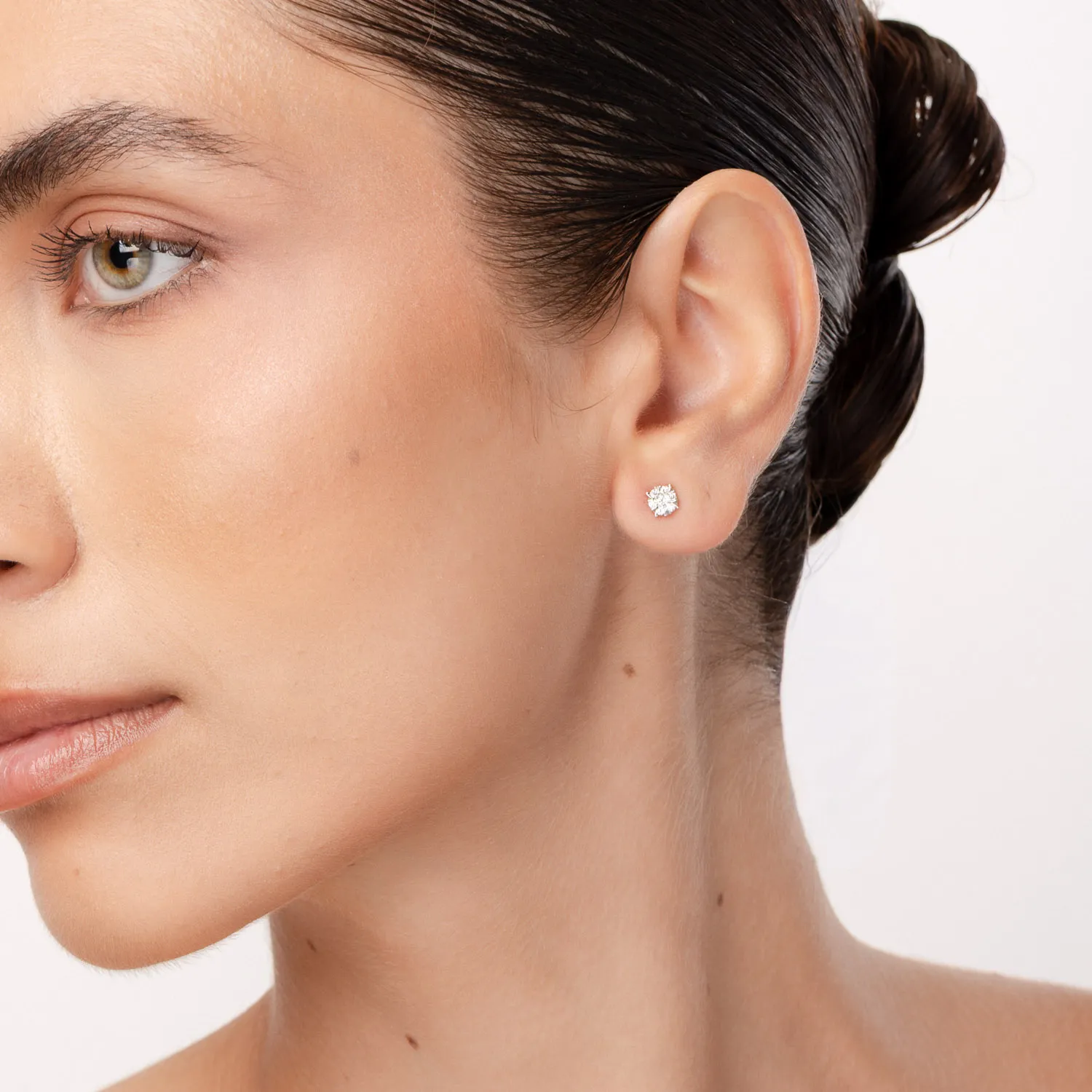 White gold screw back earrings with 0.2ct diamonds