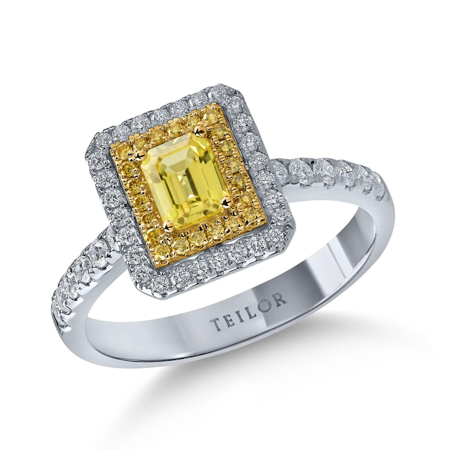 Pierścionek z biało-żółtego złota z żółtym szafirem o masie 0.49ct i diamentami o masie 0.43ct
