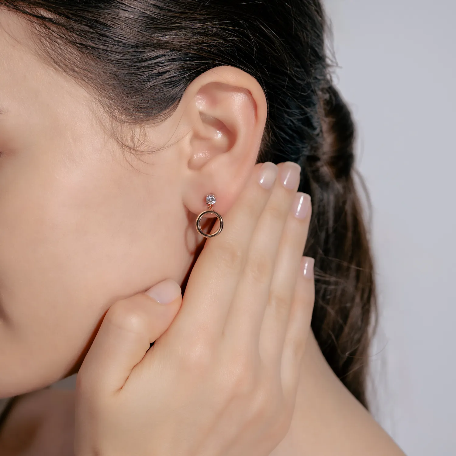 Rose gold round earrings with solitaire zirconia