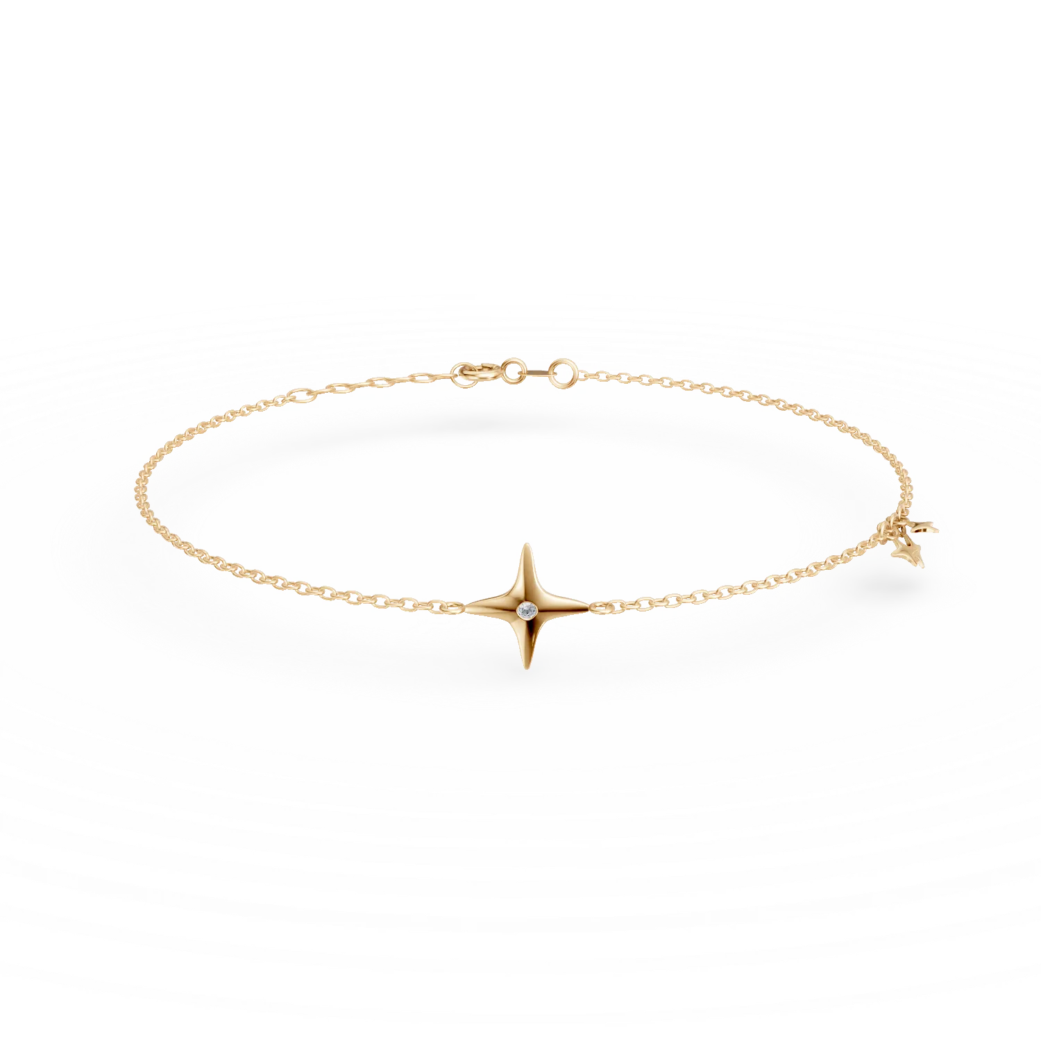 Bransoletka z żółtego złota z zawieszką w kształcie gwiazdy i diamentem o masie 0.006ct