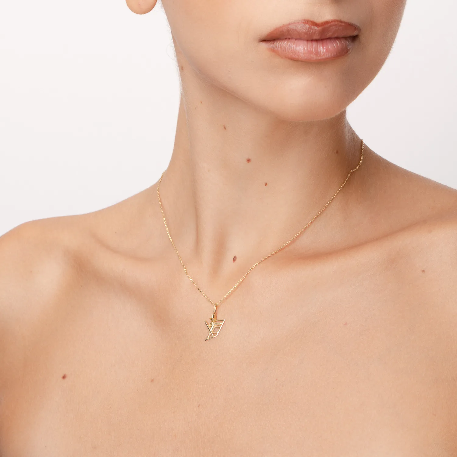 Yellow gold chimney sweeper pendant