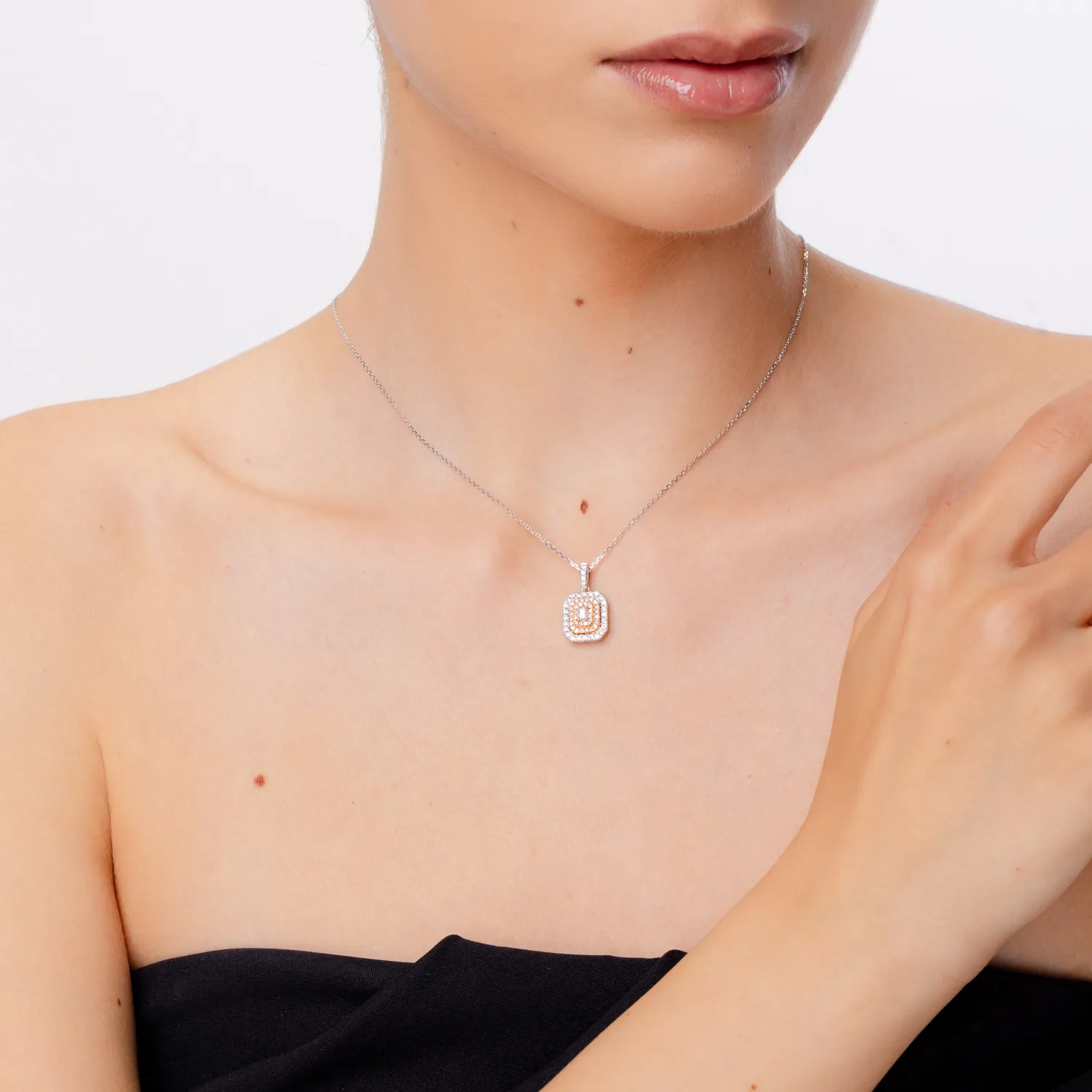 White-rose gold geometric pendant necklace with 0.6ct pink and clear diamonds