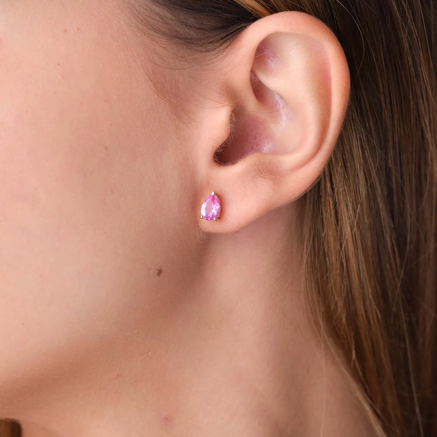 Rose gold minimalist earrings with purple zirconia