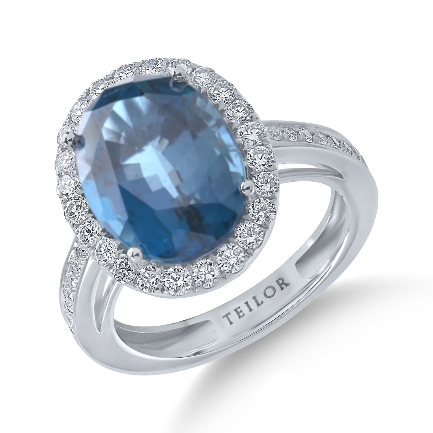 Inel din aur alb cu topaz London blue oval de 7.8ct si diamante de 0.6ct