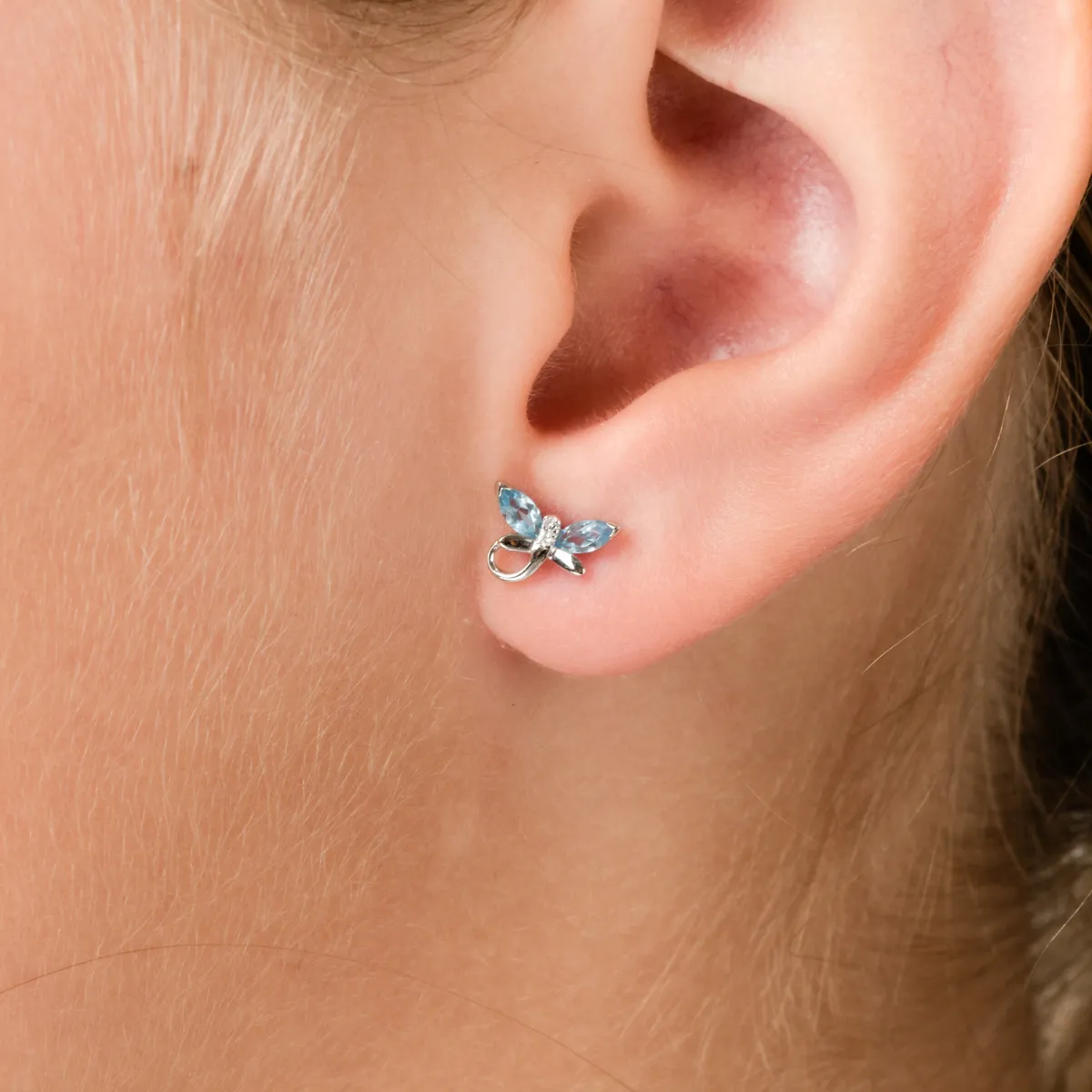 White gold children's earrings with 0.38ct blue topazes and 0.01ct diamonds