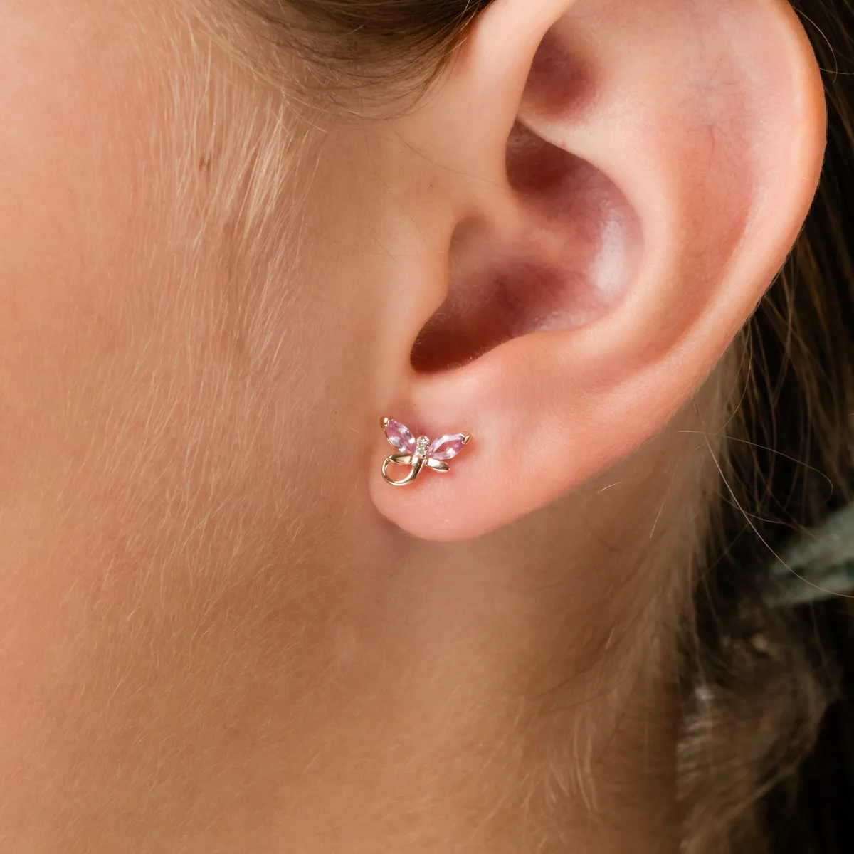 Rose gold children's earrings with 0.3ct pink sapphires and 0.01ct diamonds