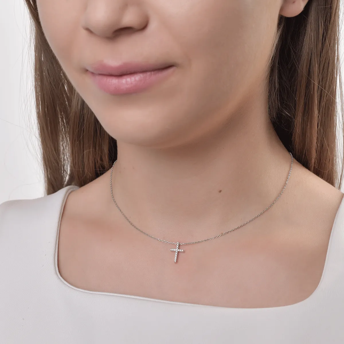 White gold cross pendant with 0.06ct diamonds