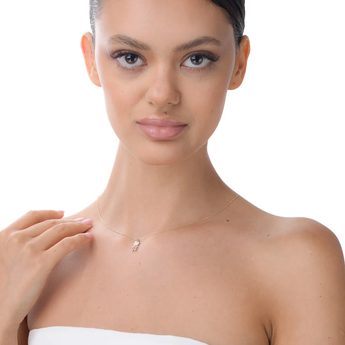 Yellow gold child pendant necklace with pink and white zirconia