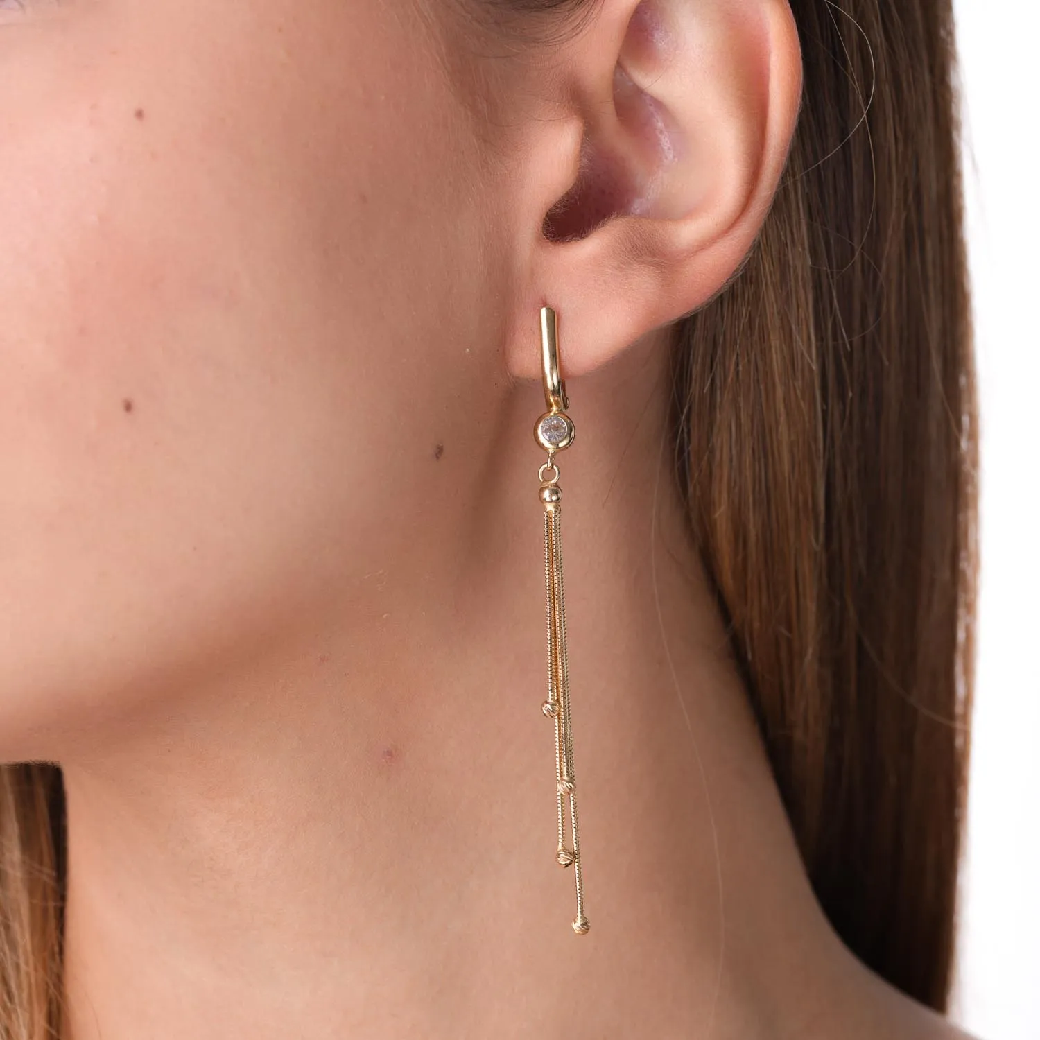 Yellow gold long earrings with zirconia