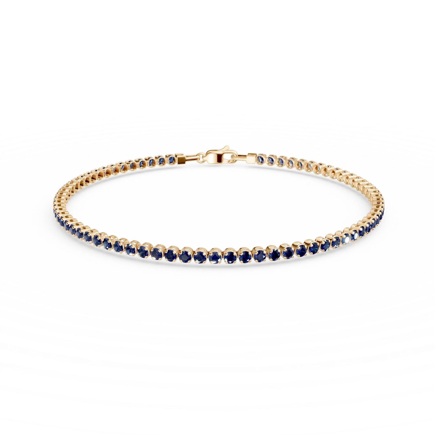 Yellow gold tennis bracelet with blue zirconia