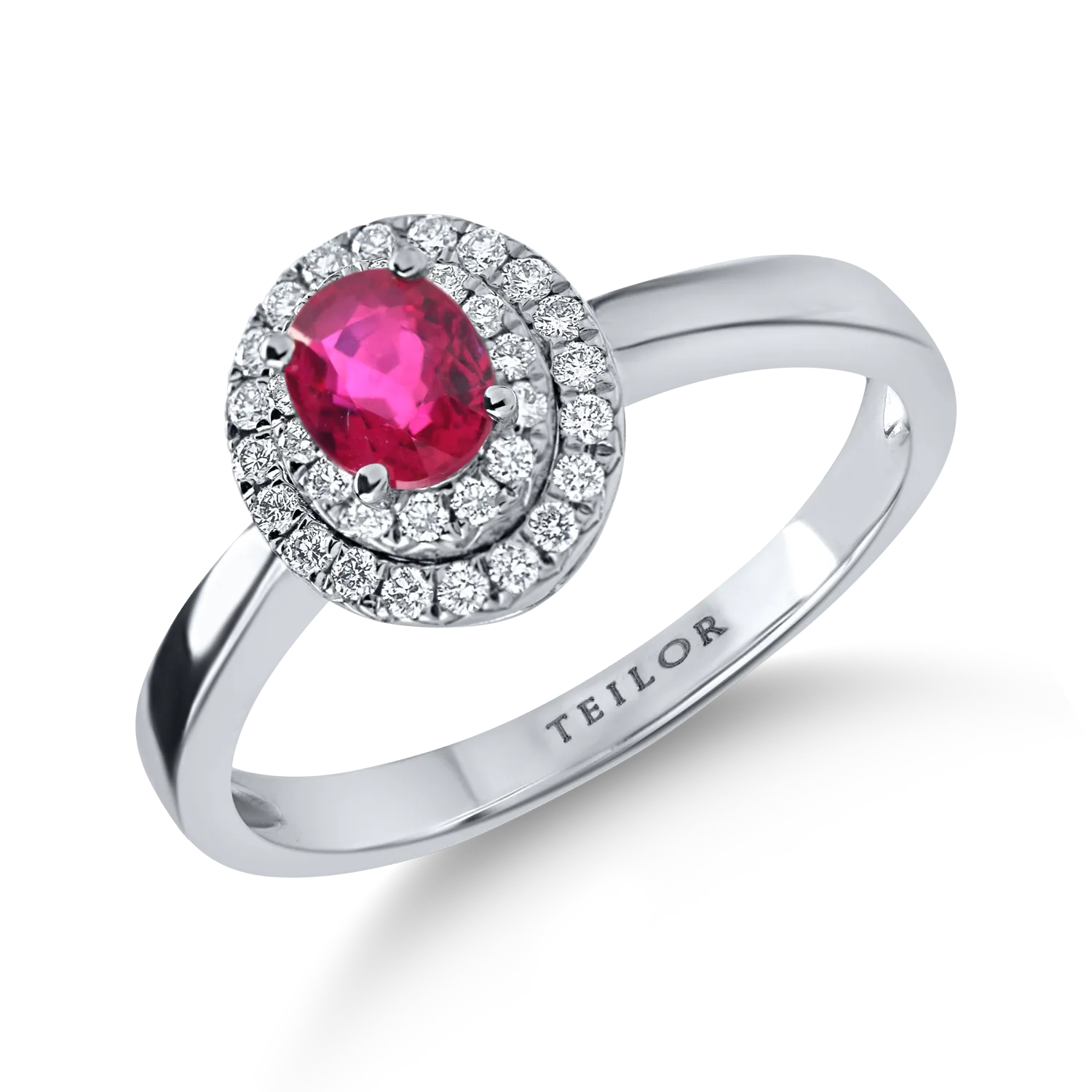 Inel din aur alb cu un rubin oval si diamante de 0.7ct