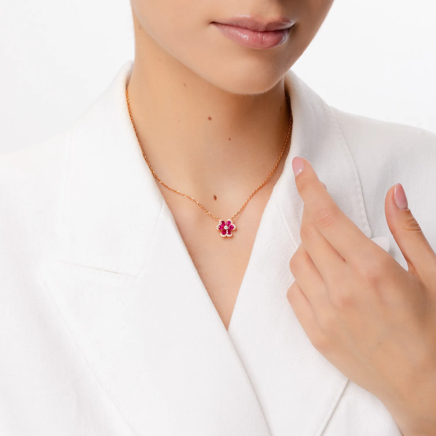 Rose gold flower pendant necklace with 1ct rubies and 0.16ct diamonds