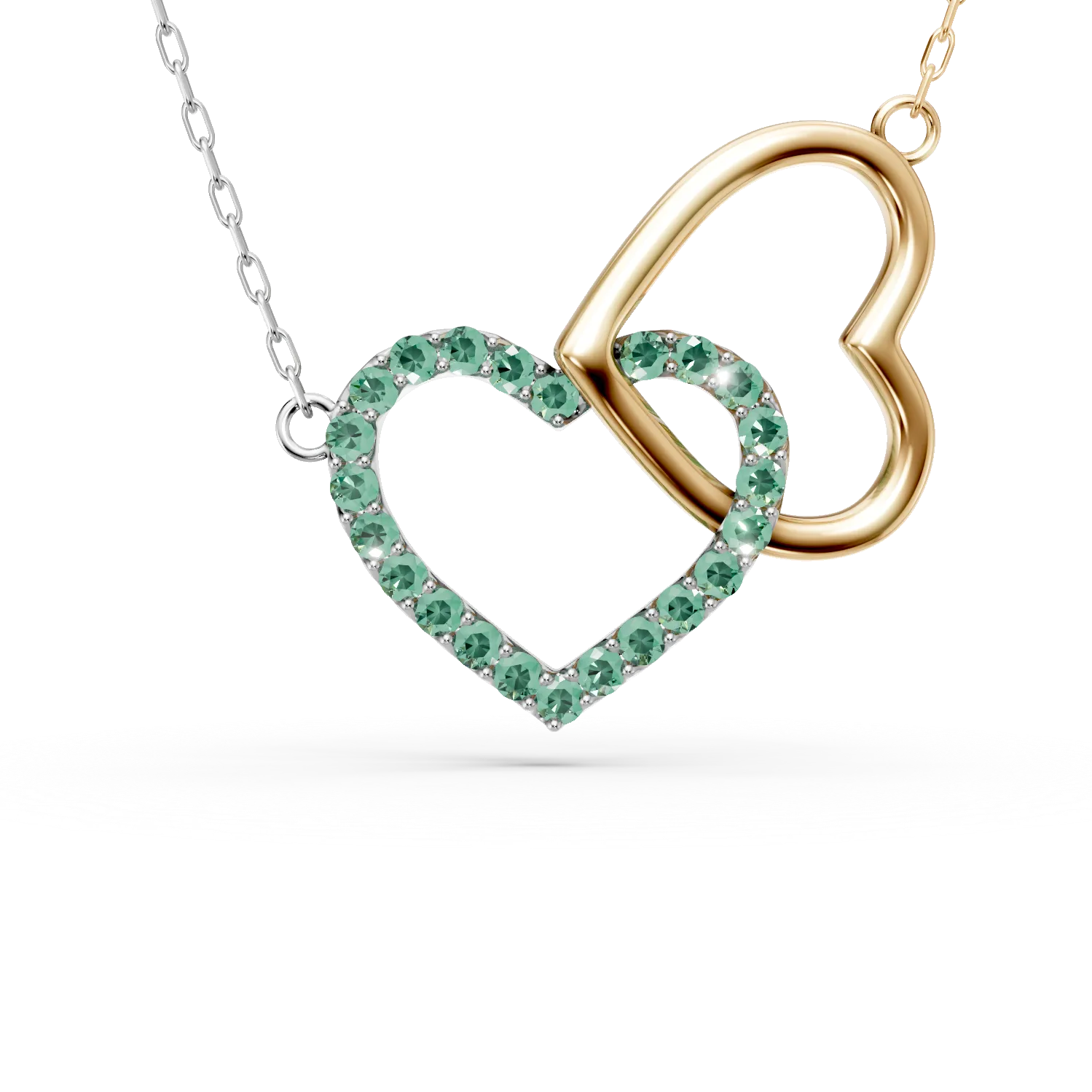 Naszyjnik z platyny i żółtego białego złota z wisiorkiem w kształcie serca i szmaragdami o masie 0.1ct