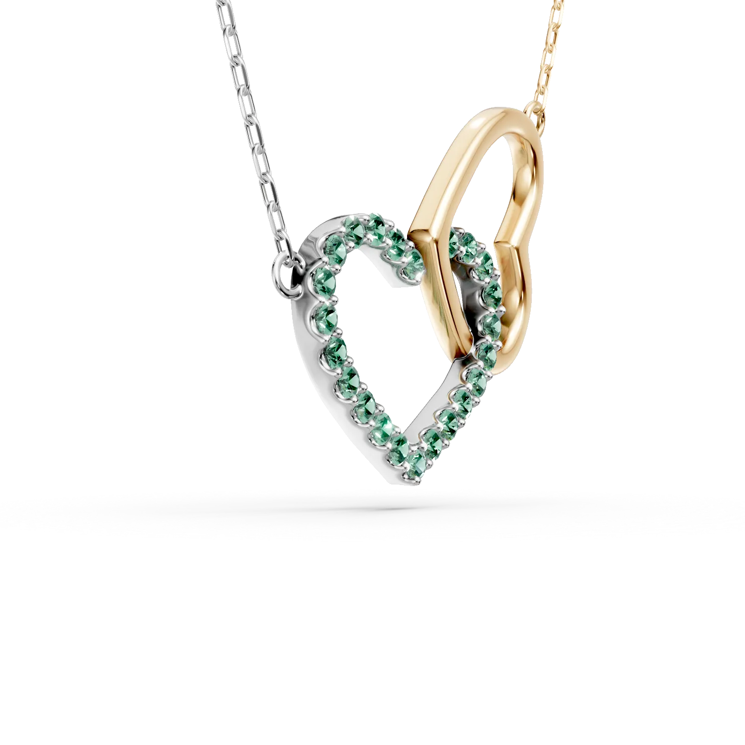 Naszyjnik z platyny i żółtego białego złota z wisiorkiem w kształcie serca i szmaragdami o masie 0.1ct