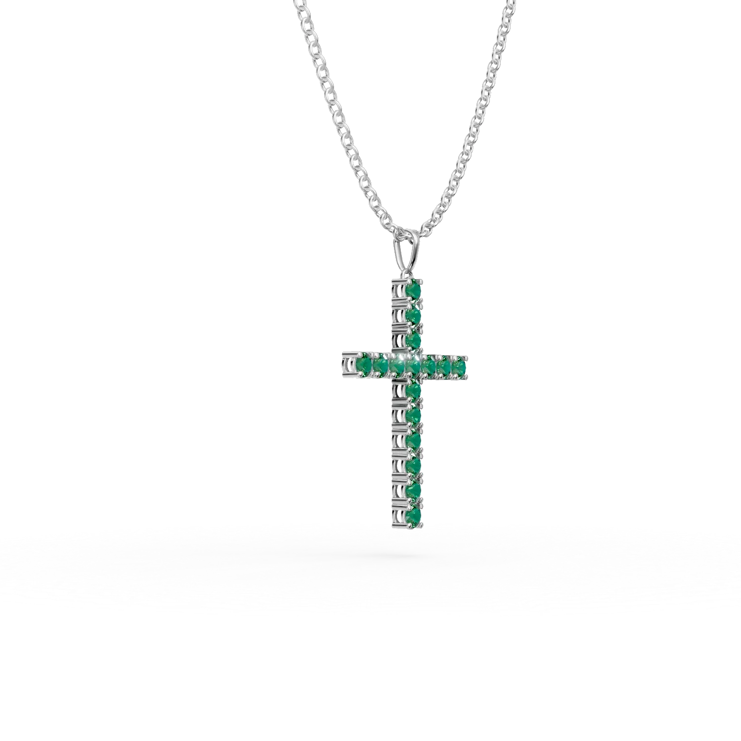 White gold cross pendant necklace with 1.1ct emeralds