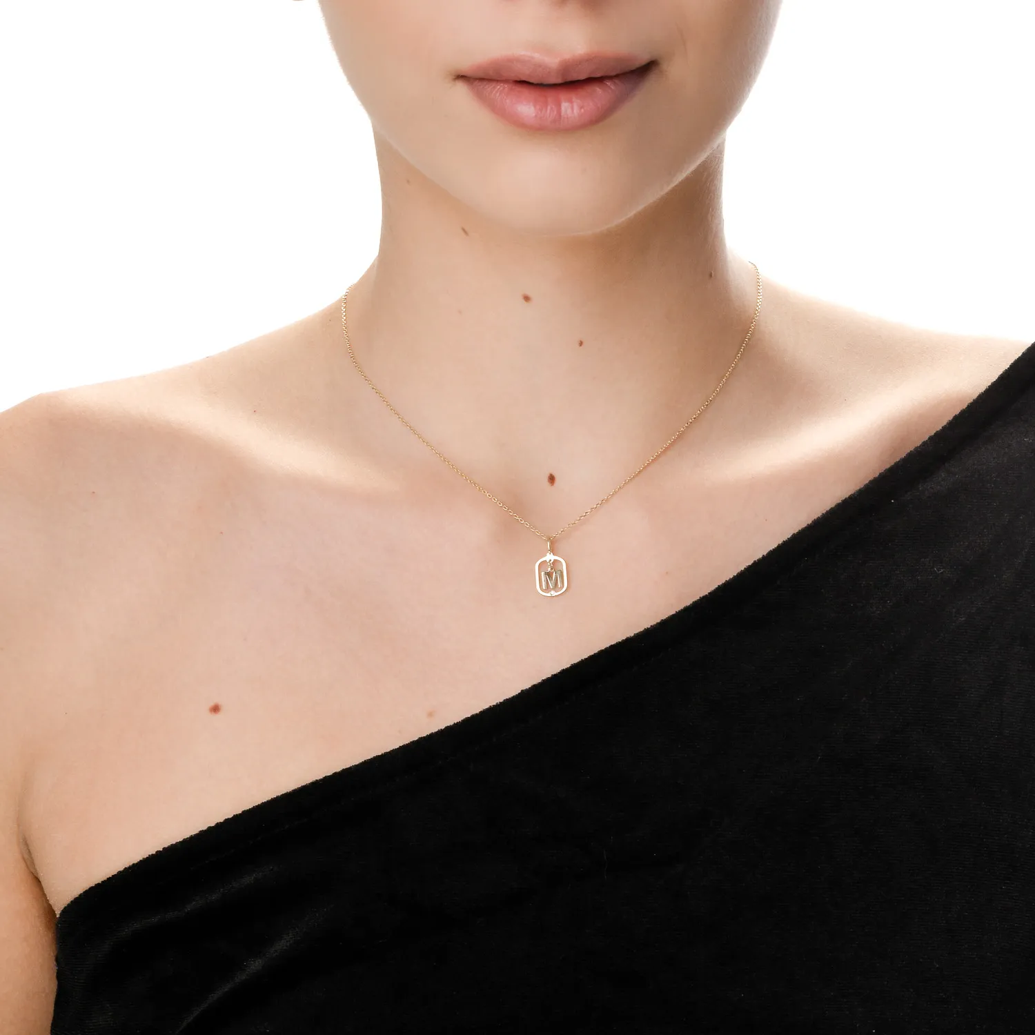 Yellow gold letter M pendant with 0.005ct diamond