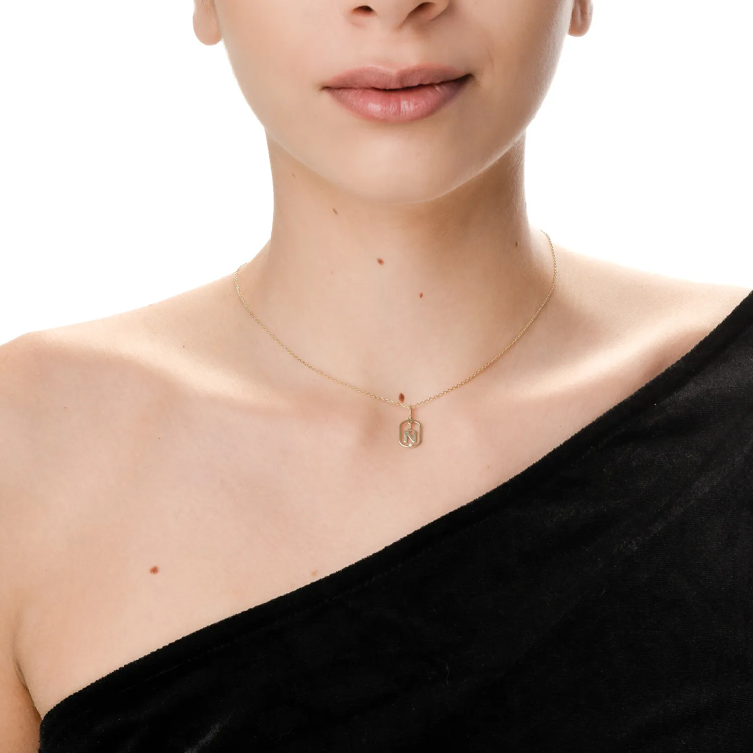 Yellow gold letter N pendant with 0.005ct diamond