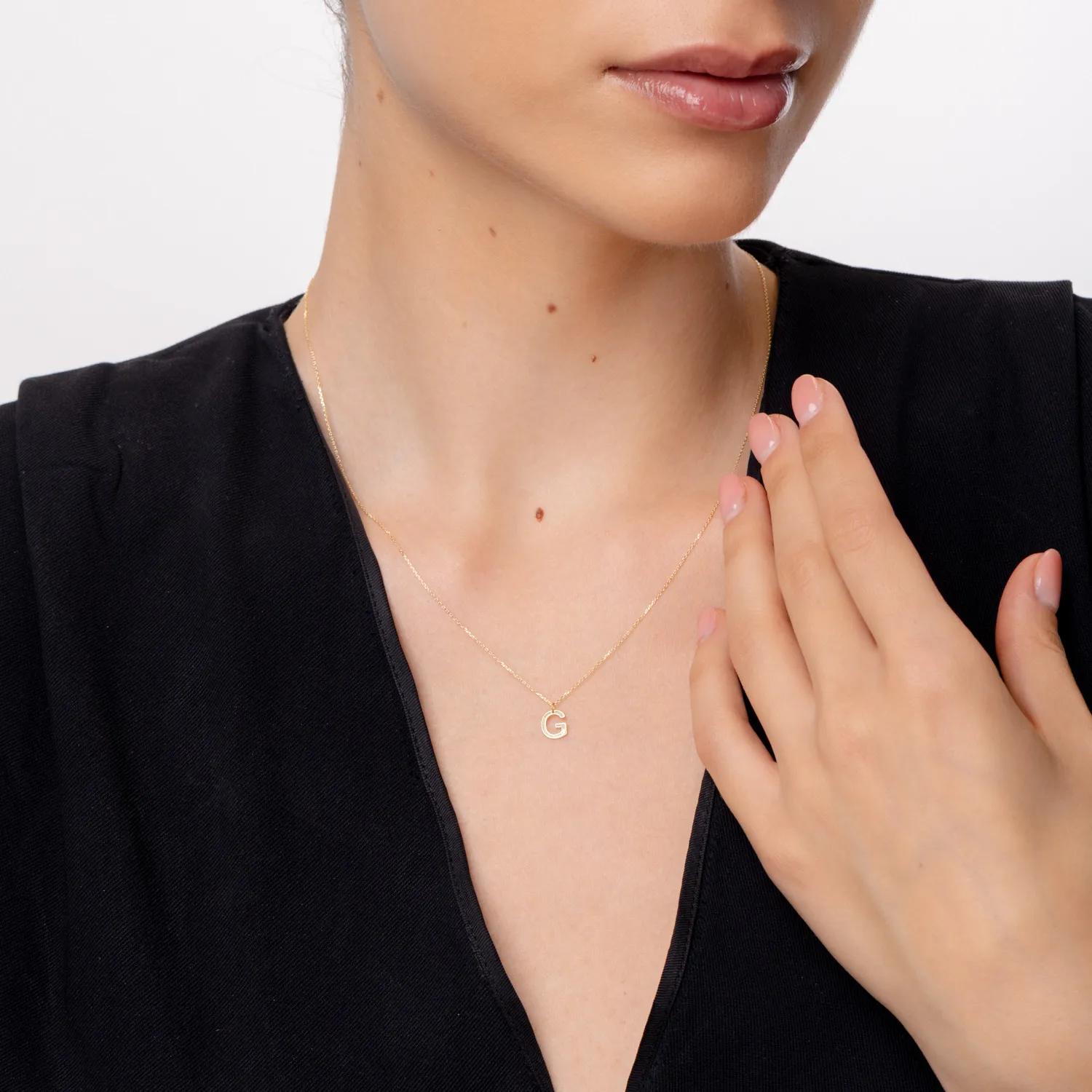Naszyjnik z zawieszka litera G z zoltego zlota z 0.005ct diamentem