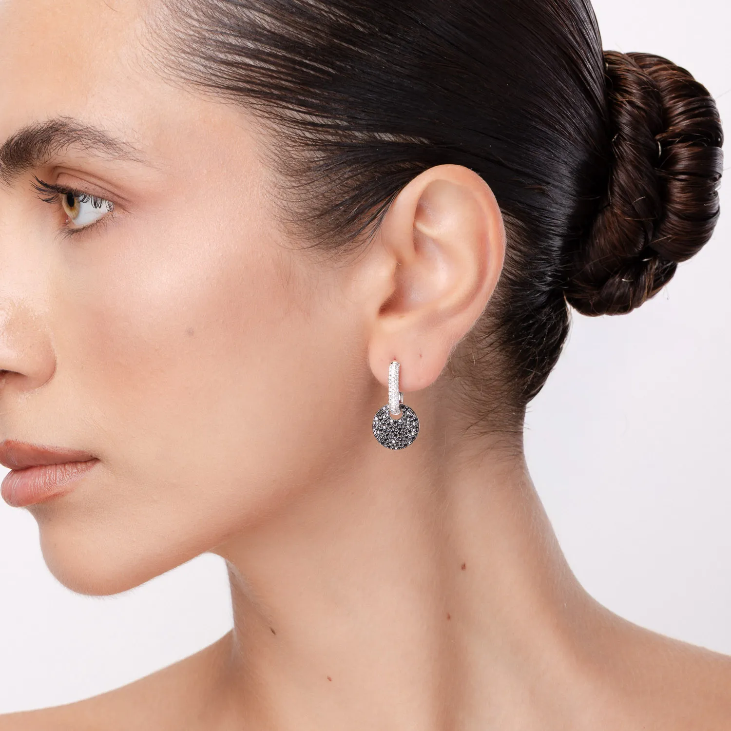 White gold earrings with 1.61ct black and white diamonds