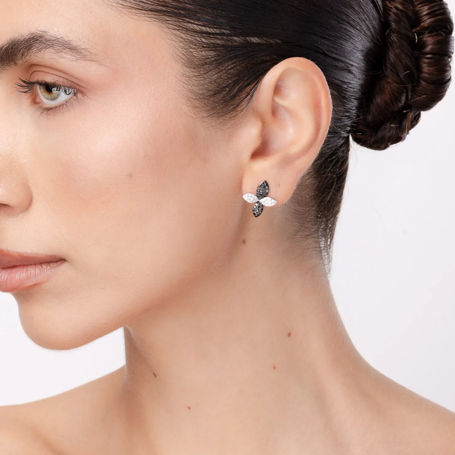 White gold floral earrings with 1.02ct black and white diamonds