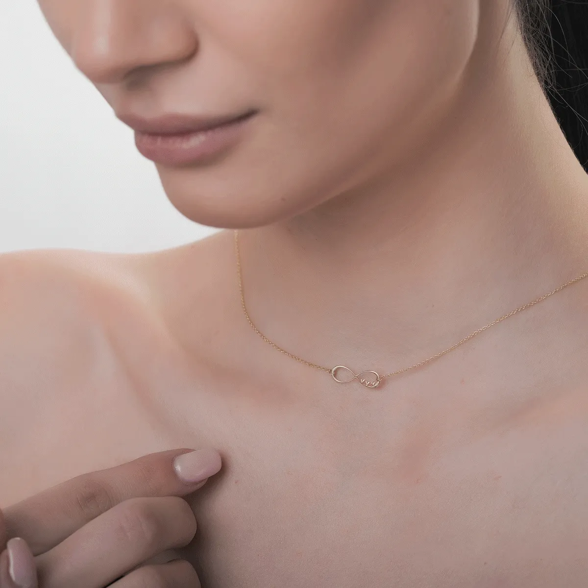 14K yellow gold necklace with infinity charm
