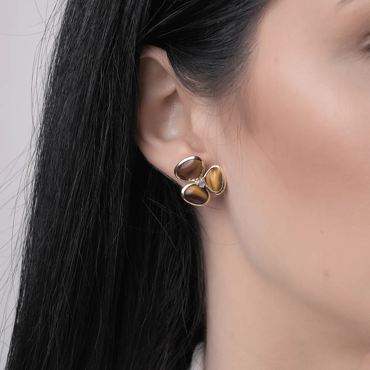 18K yellow gold earrings with 10.41ct tiger eyes and 0.081ct diamonds